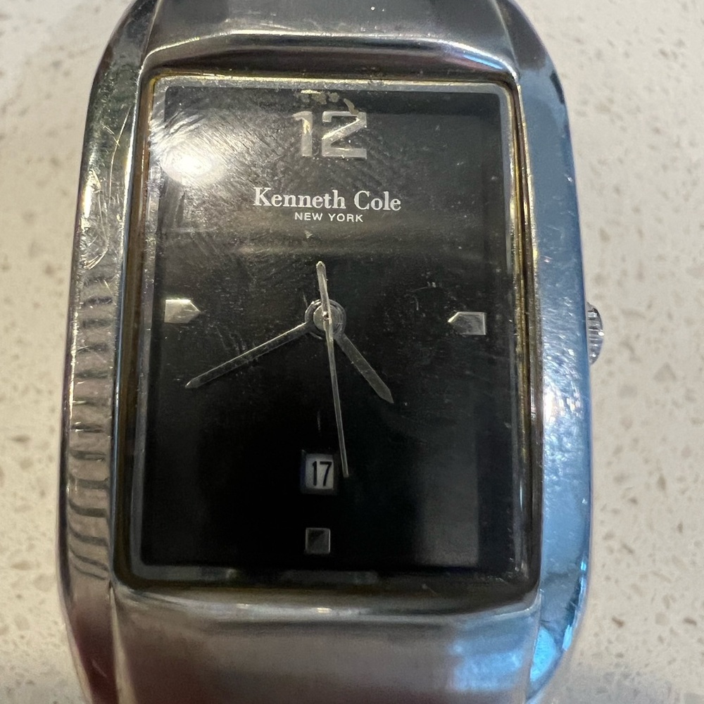 Kenneth Cole watch, usual wear and tear. But works well